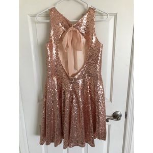 Rose gold sequin skater dress with keyhole back